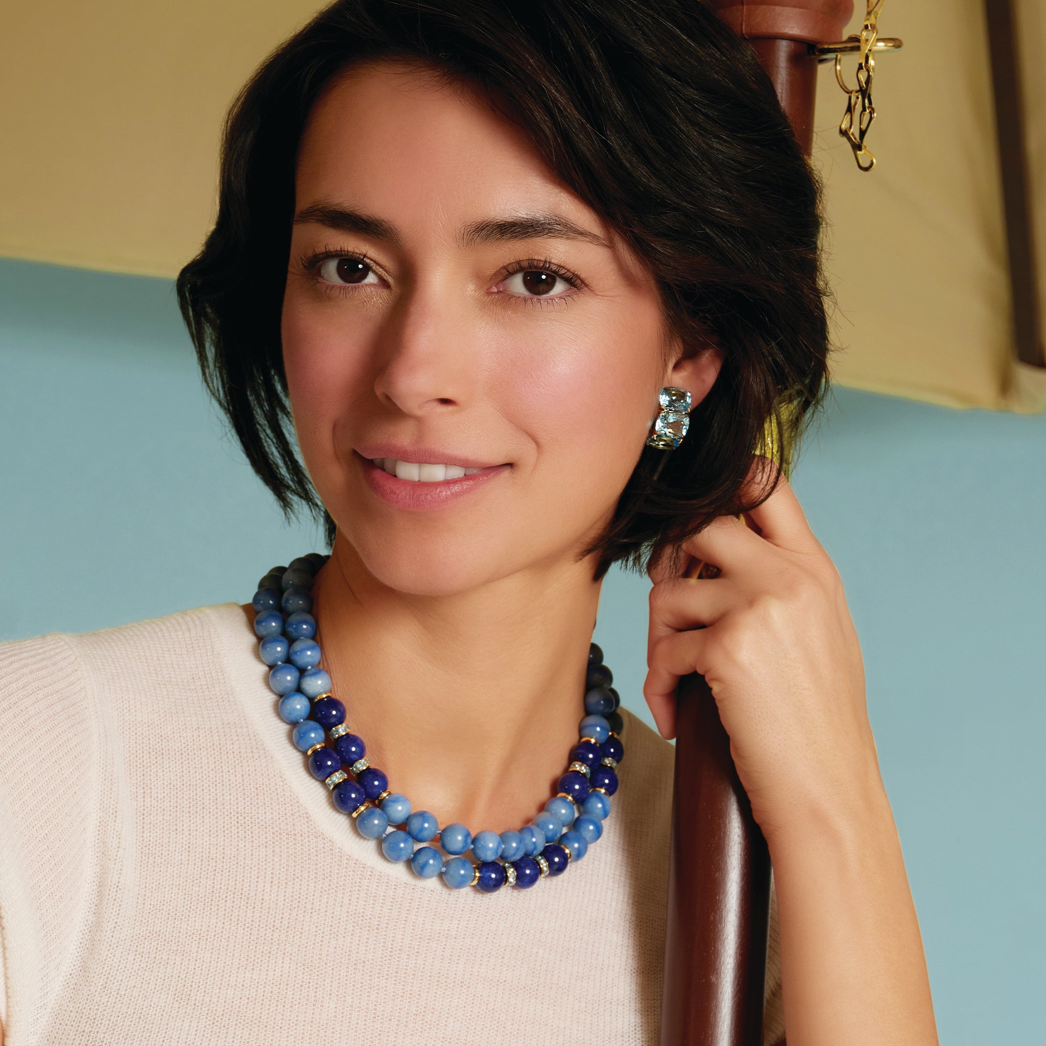 Three Stone Hoop Earrings in Blue Topaz