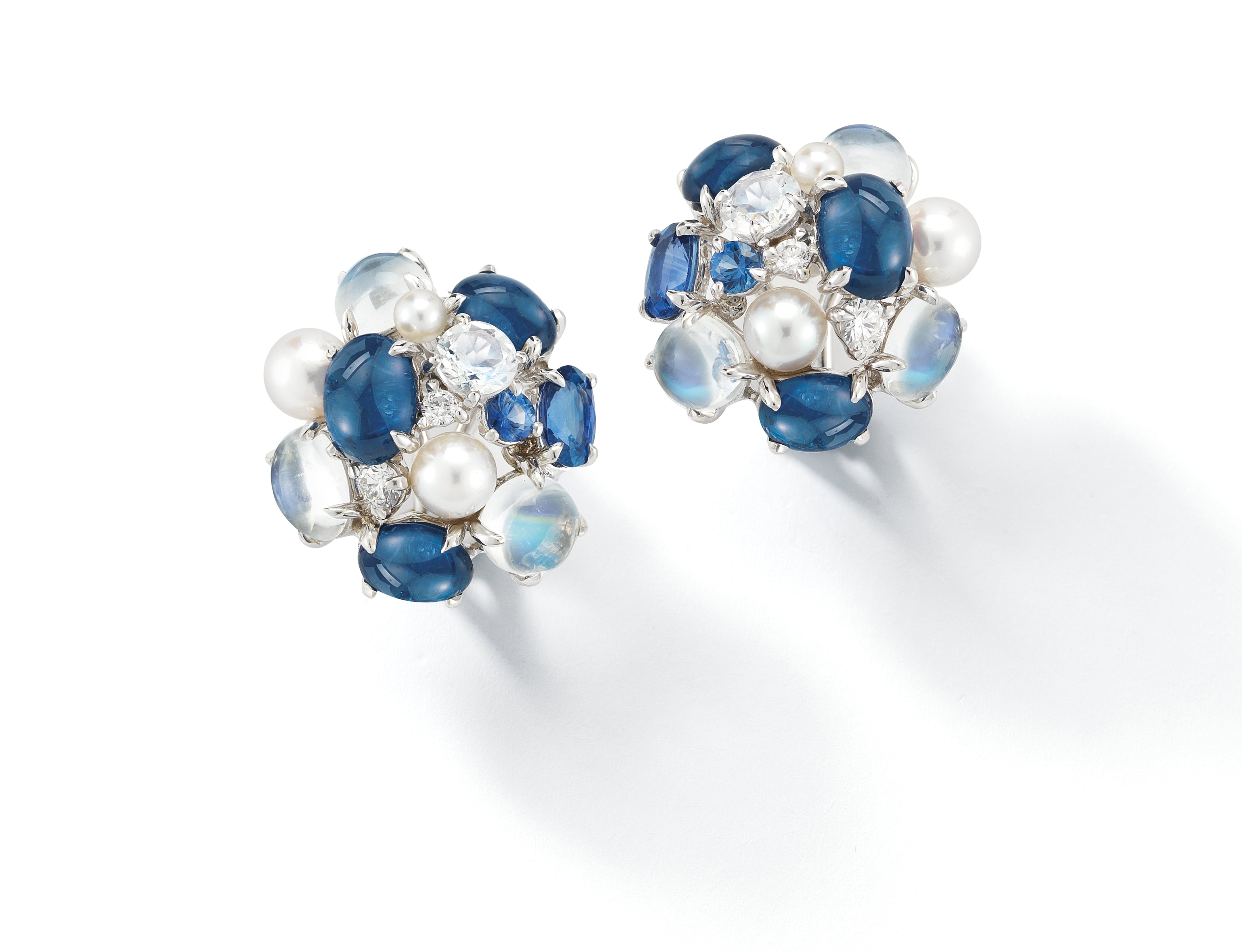 A pair of Small Bubble Earrings with Moonstone, Sapphire, Pearl and Diamond set in 18K White Gold. Signed Seaman Schepps.