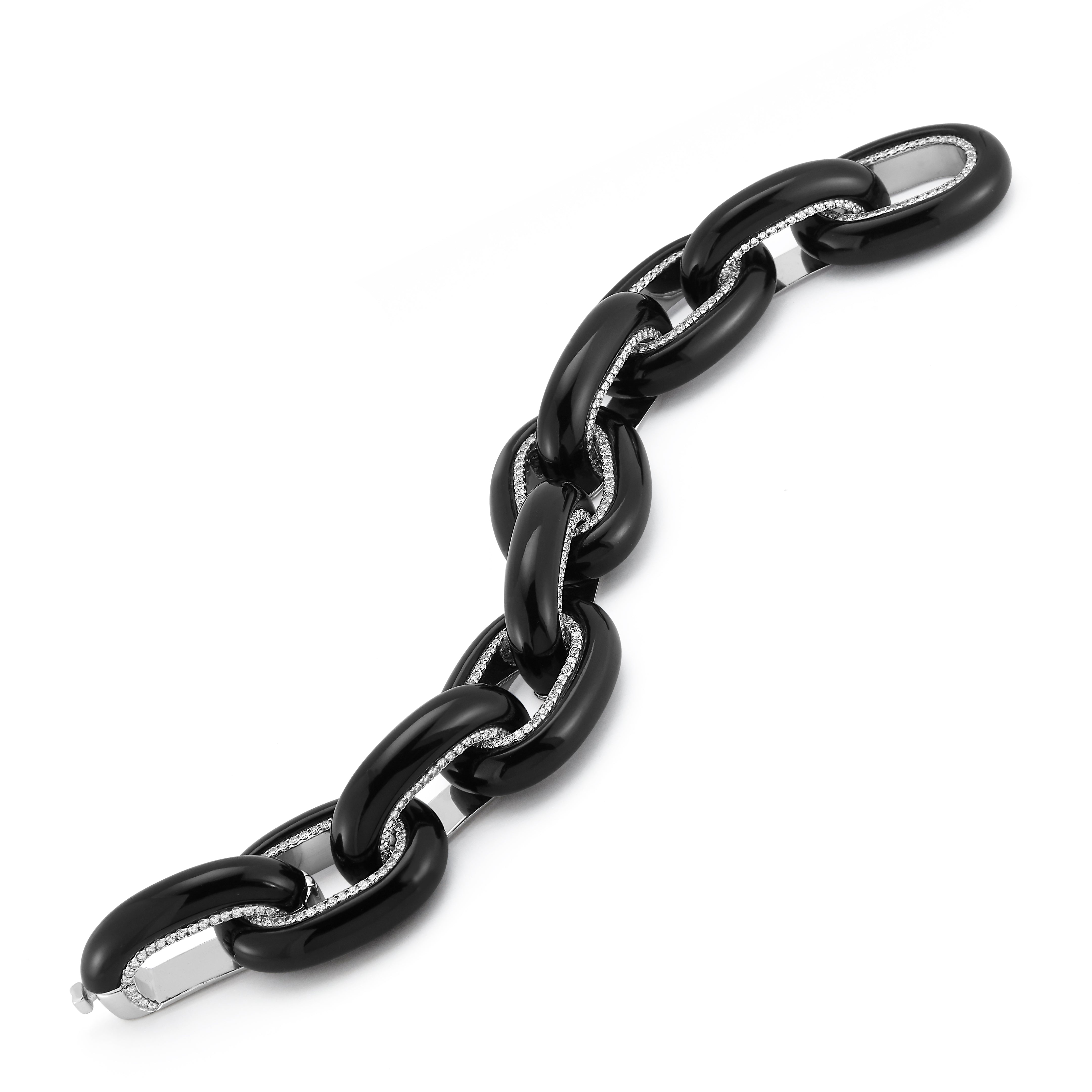Bodrum Link Bracelet in Black Onyx with Diamond Accents Set in 18 Karat White Gold. Signed Seaman Schepps.